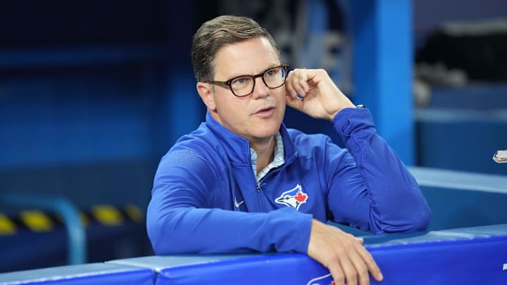 Jun 28, 2023; Toronto, Ontario, CAN; Toronto Blue Jays general manager Ross Atkins talks with the