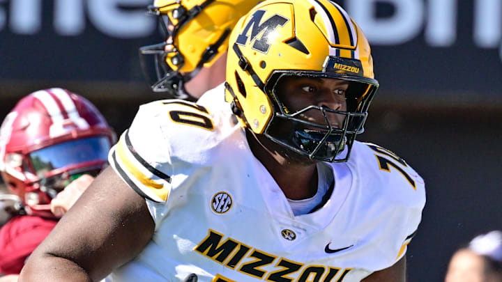 Oct 12, 2024; Amherst, Massachusetts, USA; Missouri Tigers offensive lineman Cayden Green (70) in action during the first half against the Massachusetts Minutemen at Warren McGuirk Alumni Stadium. Mandatory Credit: Eric Canha-Imagn Images