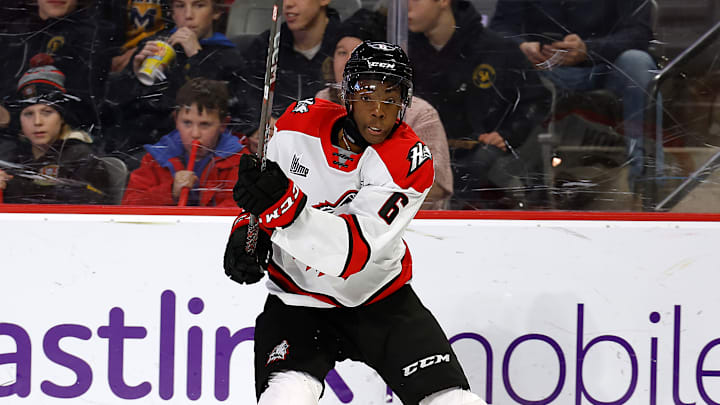 Bill Zonnon fires puck in match between Rouyn-Noranda Huskies v Moncton Wildcats