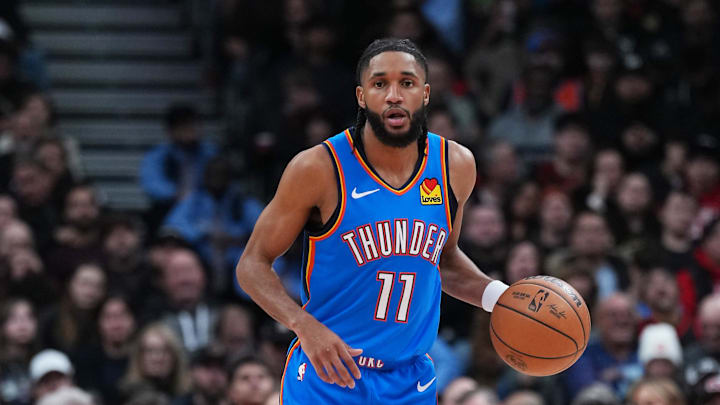 Feb 24, 2026; Toronto, Ontario, CAN; Oklahoma City Thunder guard Isaiah Joe (11) dribbles against the Toronto Raptors during the third quarter at Scotiabank Arena. Mandatory Credit: Nick Turchiaro-Imagn Images