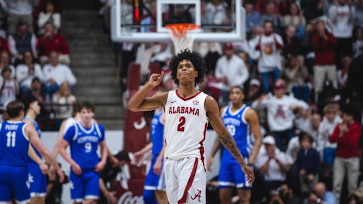 Feb 22, 2025; Tuscaloosa, Alabama, USA; Alabama Crimson Tide guard Aden Holloway (2) gestures to the crowd after a successful play against the Kentucky Wildcats during the second half at Coleman Coliseum. Feb 22, 2025; Tuscaloosa, Alabama, USA; Alabama Crimson Tide guard Aden Holloway (2) gestures to the crowd after a successful play against the Kentucky Wildcats during the second half at Coleman Coliseum.