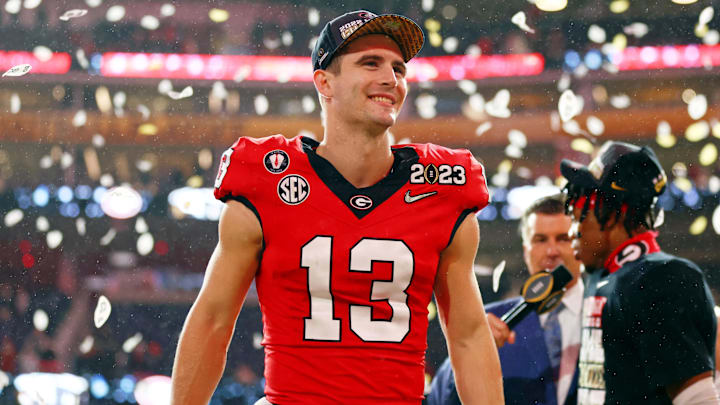 Jan 9, 2023; Inglewood, CA, USA; Georgia Bulldogs quarterback Stetson Bennett (13) celebrates after winning the CFP national championship game against the TCU Horned Frogs at SoFi Stadium. Mandatory Credit: Mark J. Rebilas-Imagn Images Jan 9, 2023; Inglewood, CA, USA; Georgia Bulldogs quarterback Stetson Bennett (13) celebrates after winning the CFP national championship game against the TCU Horned Frogs at SoFi Stadium. Mandatory Credit: Mark J. Rebilas-Imagn Images