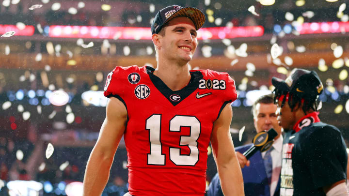 Jan 9, 2023; Inglewood, CA, USA; Georgia Bulldogs quarterback Stetson Bennett (13) celebrates after winning the CFP national championship game against the TCU Horned Frogs at SoFi Stadium. Mandatory Credit: Mark J. Rebilas-USA TODAY Sports Jan 9, 2023; Inglewood, CA, USA; Georgia Bulldogs quarterback Stetson Bennett (13) celebrates after winning the CFP national championship game against the TCU Horned Frogs at SoFi Stadium. Mandatory Credit: Mark J. Rebilas-USA TODAY Sports