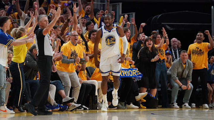 May 10, 2025; San Francisco, California, USA; Golden State Warriors forward Jonathan Kuminga (00) celebrates after scoring against the Minnesota Timberwolves in the third quarter during game three in the second round of the 2025 NBA Playoffs at Chase Center. Mandatory Credit: David Gonzales-Imagn Images