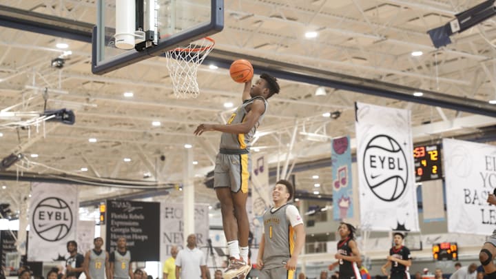 Team Melo   s Kiyan Anthony (7) looks to penetrate the defense of Team Mokan Elite during the Nike EYBL Session 4 on May 27, 2023 at Memphis Sports and Events Center in Memphis, Tenn.