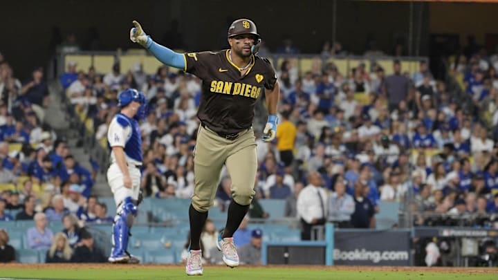 Oct 6, 2024; Los Angeles, California, USA; San Diego Padres shortstop Xander Bogaerts (2) reacts after hitting a solo home run in the eighth inning against the Los Angeles Dodgers during game two of the NLDS for the 2024 MLB Playoffs at Dodger Stadium. Oct 6, 2024; Los Angeles, California, USA; San Diego Padres shortstop Xander Bogaerts (2) reacts after hitting a solo home run in the eighth inning against the Los Angeles Dodgers during game two of the NLDS for the 2024 MLB Playoffs at Dodger Stadium.