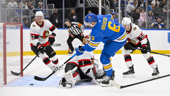 Oct 2, 2025; St. Louis, Missouri, USA; St. Louis Blues defenseman Philip Broberg (6) shoots and scores against Ottawa Senators goaltender Leevi Meriläinen (1) during the second period at Enterprise Center. Mandatory Credit: Jeff Curry-Imagn Images