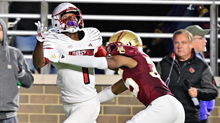 Oct 25, 2024; Chestnut Hill, Massachusetts, USA; Louisville Cardinals wide receiver Ja'Corey Brooks (1) makes a catch while being defended by Boston College Eagles defensive back Ashton McShane (35) during the second half at Alumni Stadium. Mandatory Credit: Eric Canha-Imagn Images Oct 25, 2024; Chestnut Hill, Massachusetts, USA; Louisville Cardinals wide receiver Ja'Corey Brooks (1) makes a catch while being defended by Boston College Eagles defensive back Ashton McShane (35) during the second half at Alumni Stadium. Mandatory Credit: Eric Canha-Imagn Images
