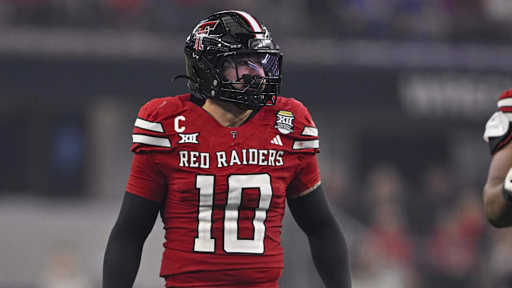 Dec 6, 2025; Arlington, TX, USA; Texas Tech Red Raiders linebacker Jacob Rodriguez (10) gets into position during the game between the Red Raiders and the Cougars at AT&T Stadium. Mandatory Credit: Jerome Miron-Imagn Images