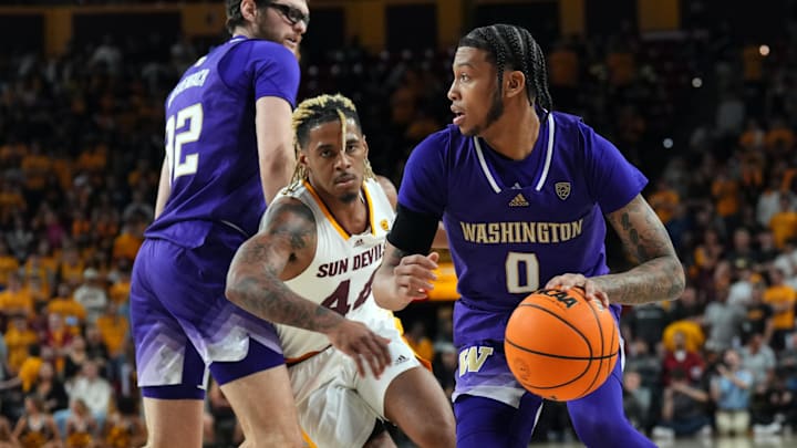 Feb 22, 2024; Tempe, Arizona, USA; Washington Huskies guard Koren Johnson (0) dribbles by Arizona