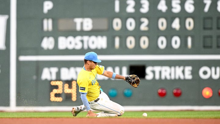 Sep 28, 2024; Boston, Massachusetts, USA; Boston Red Sox second baseman Vaughn Grissom (5) chases a loose ball during the seventh inning of a game against the Tampa Bay Rays at Fenway Park. Mandatory Credit: Brian Fluharty-Imagn Images Sep 28, 2024; Boston, Massachusetts, USA; Boston Red Sox second baseman Vaughn Grissom (5) chases a loose ball during the seventh inning of a game against the Tampa Bay Rays at Fenway Park. Mandatory Credit: Brian Fluharty-Imagn Images