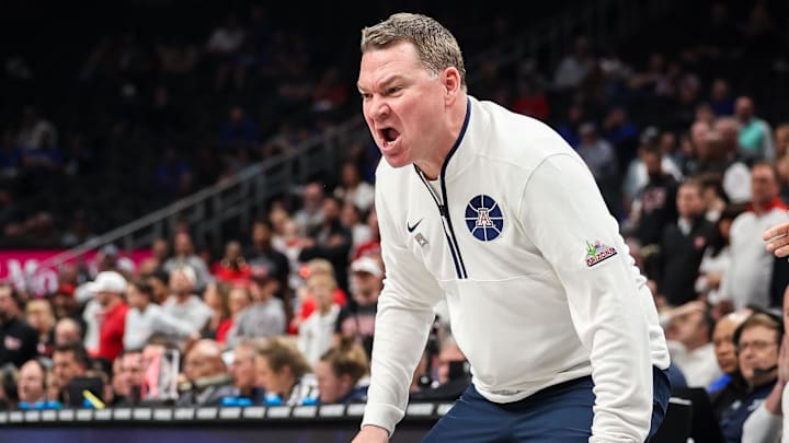 Arizona Wildcats coach Tommy Lloyd reacts to a play during the Big 12 Tournament semifinals in Kansas City.