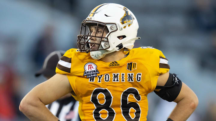 Dec 30, 2022; Tucson, AZ, USA; Wyoming Cowboys defensive end Braden Siders (86) against the Ohio Bobcats during the 2022 Barstool Sports Arizona Bowl at Arizona Stadium. Mandatory Credit: Mark J. Rebilas-Imagn Images
