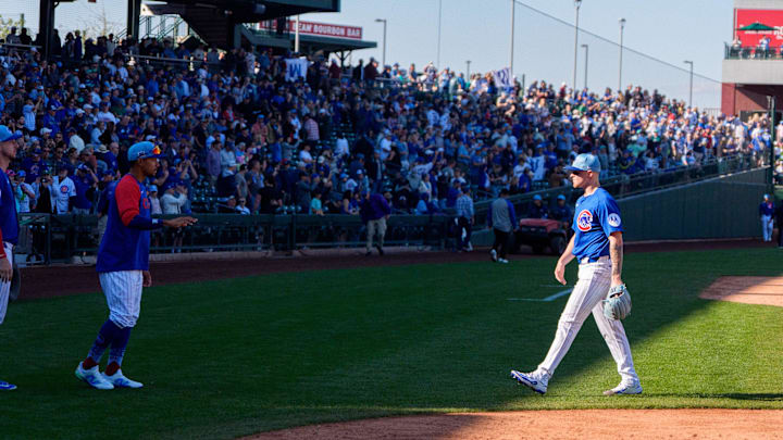 Mar 8, 2025; Mesa, Arizona, USA; Chicago Cubs pitcher Cade Horton (70) walks off the field after the Chicago Cubs win a spring training against the Seattle Mariners at Sloan Park. The Cubs beat the Mariners 9-8. 