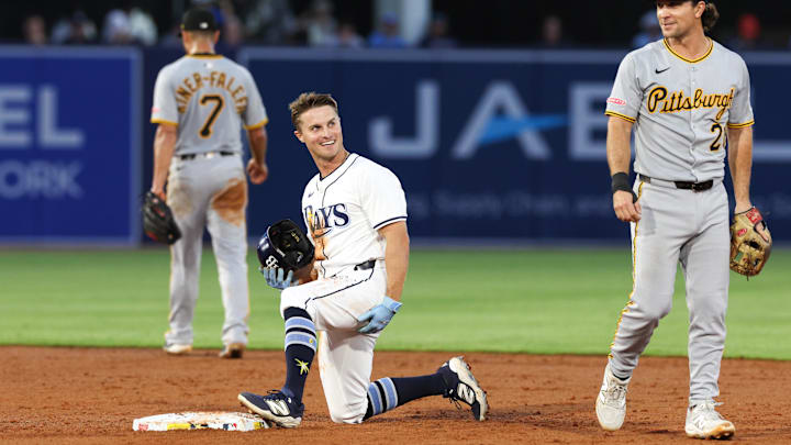 St. Petersburg, Florida, USA; Tampa Bay Rays right fielder Jake Mangum (28) reacts to Pittsburgh Pirates second baseman Adam Frazier (26) after stealing second base in the third inning at George M. Steinbrenner Field. St. Petersburg, Florida, USA; Tampa Bay Rays right fielder Jake Mangum (28) reacts to Pittsburgh Pirates second baseman Adam Frazier (26) after stealing second base in the third inning at George M. Steinbrenner Field.