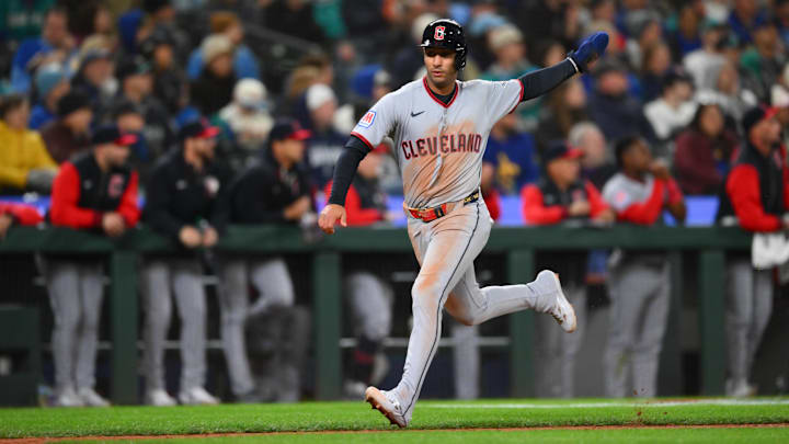 Mar 26, 2026; Seattle, Washington, USA; Cleveland Guardians second baseman Brayan Rocchio (4) scores a run against the Seattle Mariners during the seventh inning at T-Mobile Park. Mandatory Credit: Steven Bisig-Imagn Images Mar 26, 2026; Seattle, Washington, USA; Cleveland Guardians second baseman Brayan Rocchio (4) scores a run against the Seattle Mariners during the seventh inning at T-Mobile Park. Mandatory Credit: Steven Bisig-Imagn Images
