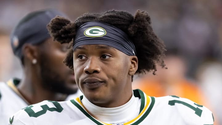 Oct 19, 2025; Glendale, Arizona, USA; Green Bay Packers wide receiver Dontayvion Wicks (13) against the Arizona Cardinals at State Farm Stadium. Mandatory Credit: Mark J. Rebilas-Imagn Images