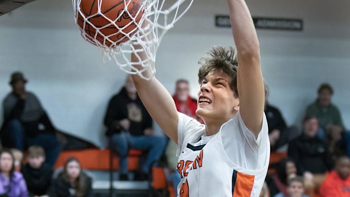 Green s Nikola Bundalo dunks against McKinley on Friday, Feb. 3, 2023.
Mckinley Green Boys Green s Nikola Bundalo dunks against McKinley on Friday, Feb. 3, 2023.
Mckinley Green Boys