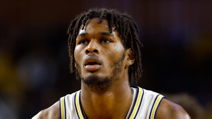 Dec 21, 2025; Ann Arbor, Michigan, USA; Michigan Wolverines forward Morez Johnson Jr. (21) shoots a free throw during the first half against the La Salle Explorers at Crisler Center. Mandatory Credit: Brian Bradshaw Sevald-Imagn Images Dec 21, 2025; Ann Arbor, Michigan, USA; Michigan Wolverines forward Morez Johnson Jr. (21) shoots a free throw during the first half against the La Salle Explorers at Crisler Center. Mandatory Credit: Brian Bradshaw Sevald-Imagn Images