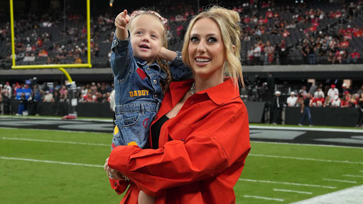 Brittany Mahomes, the wife of Kansas City Chiefs quarterback Patrick Mahomes (15) holds daughter Sterling Mahomes during the game against the Las Vegas Raiders at Allegiant Stadium.