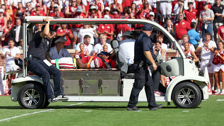 Oklahoma wide receiver Keontez Lewis is taken off the field on a cart after being injured during the first half of Saturday's game vs. Kent State at Gaylord Family - Oklahoma Memorial Stadium in Norman.