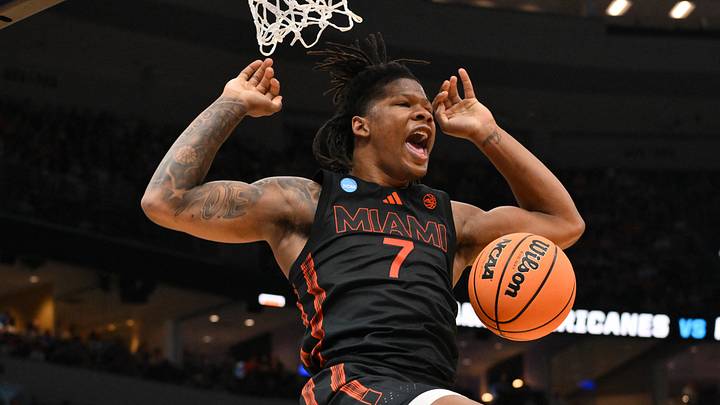 Mar 22, 2026; St. Louis, MO, USA; Miami Hurricanes forward Shelton Henderson (7) reacts after a dunk during the first half against the Purdue Boilermakers during a second round game of the men's 2026 NCAA Tournament at Enterprise Center. Mandatory Credit: Jeff Curry-Imagn Images