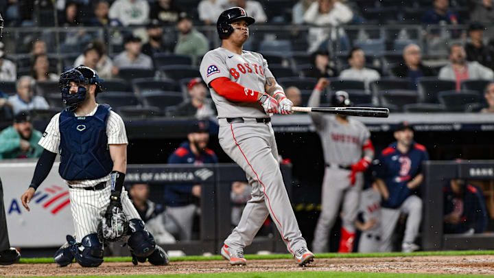 Jun 8, 2025; Bronx, New York, USA; Boston Red Sox designated hitter Rafael Devers (11) reacts after hitting a solo home run