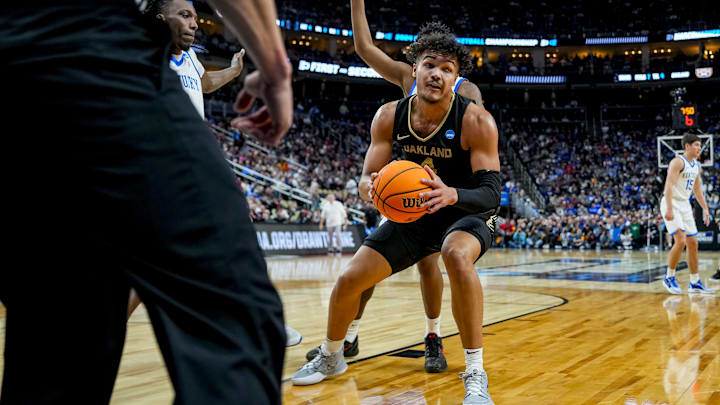 Mar 21, 2024; Pittsburgh, PA, USA; Oakland Golden Grizzlies forward Trey Townsend (4) handles the