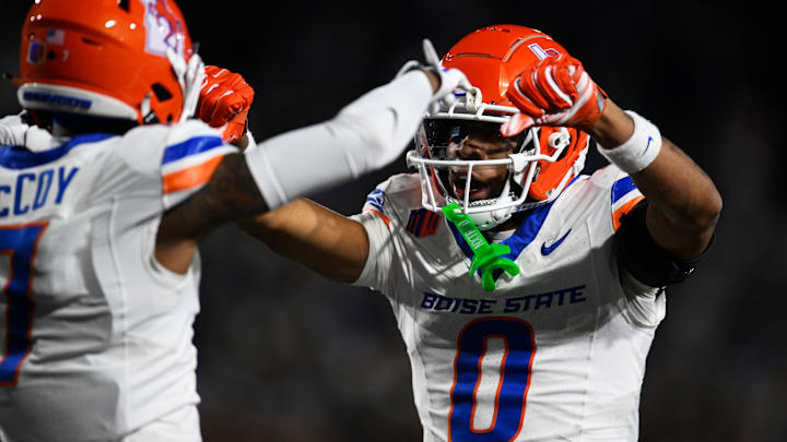 Boise State's Ty Benefield and A'Marion McCoy celebrate during a game against San Jose State