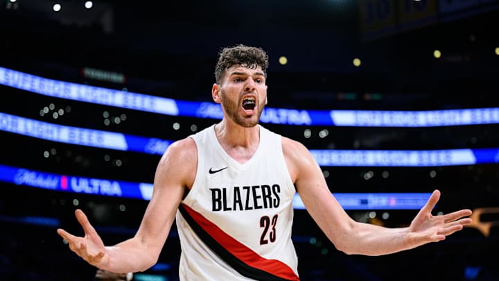 Oct 27, 2025; Los Angeles, California, USA; Portland Trail Blazers center Donovan Clingan (23) reacts during the first half against the Los Angeles Lakers at Crypto.com Arena. Mandatory Credit: William Liang-Imagn Images Oct 27, 2025; Los Angeles, California, USA; Portland Trail Blazers center Donovan Clingan (23) reacts during the first half against the Los Angeles Lakers at Crypto.com Arena. Mandatory Credit: William Liang-Imagn Images