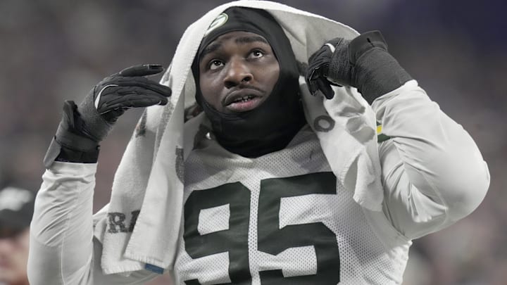 Green Bay Packers defensive tackle Devonte Wyatt (95) heads to the locker room during the third quarter against the Minnesota Vikings at U.S. Bank Stadium.