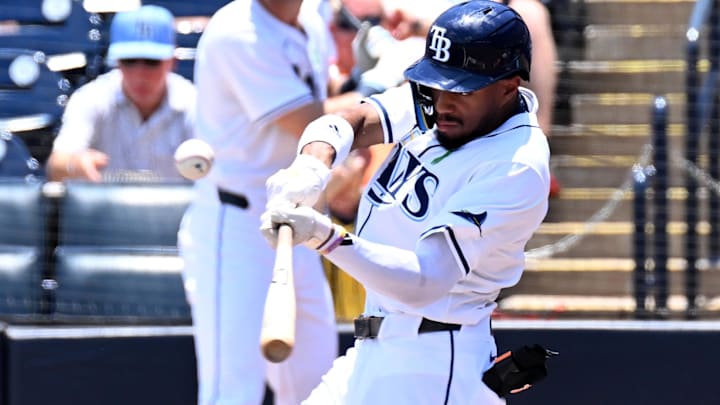 Tampa Bay Rays left fielder Chandler Simpson (14) hits a RBI single in the first inning against the Houston Astros at George M. Steinbrenner Field in Tampa, Fla., on May 25, 2025.