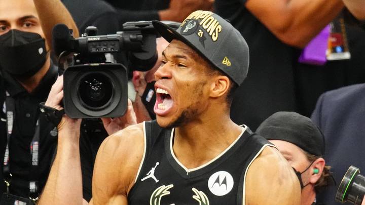Jul 20, 2021; Milwaukee, Wisconsin, USA; Milwaukee Bucks forward Giannis Antetokounmpo (34) celebrates after winning game six of the 2021 NBA Finals and the championship against the Phoenix Suns at Fiserv Forum. Mandatory Credit: Mark J. Rebilas-Imagn Images Jul 20, 2021; Milwaukee, Wisconsin, USA; Milwaukee Bucks forward Giannis Antetokounmpo (34) celebrates after winning game six of the 2021 NBA Finals and the championship against the Phoenix Suns at Fiserv Forum. Mandatory Credit: Mark J. Rebilas-Imagn Images