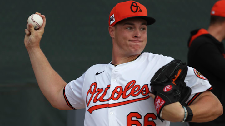 Feb 16, 2025; Sarasota, FL, USA; Baltimore Orioles pitcher Justin Armbruester (66)  throws a bullpen session during spring training workouts at Ed Smith Stadium. 