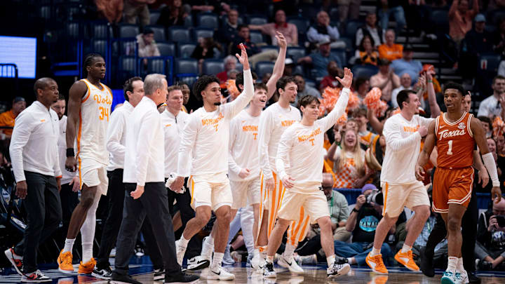 The Tennessee bench celebrates a made three against Texas before a timeout was called during the second half of their quarterfinal game of the SEC Men's Basketball Tournament at Bridgestone Arena in Nashville, Tenn., Friday, March 14, 2025.
