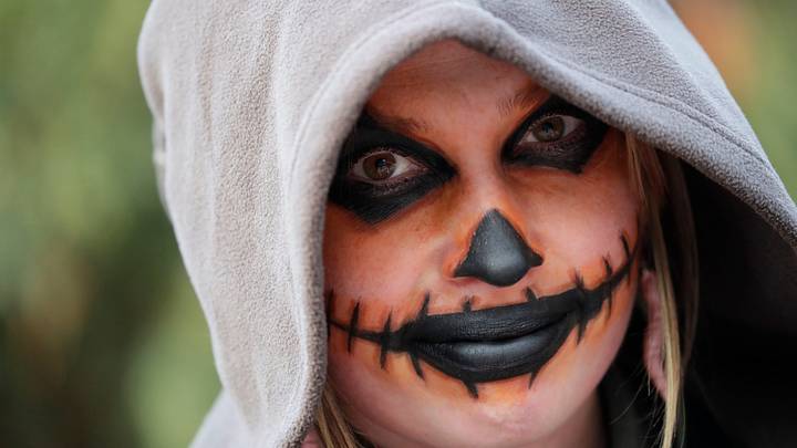 Mackenzie Pahlke greets trick-or-treaters on Halloween Friday, October 31, 2025, in Appleton, Wisconsin. Mackenzie Pahlke greets trick-or-treaters on Halloween Friday, October 31, 2025, in Appleton, Wisconsin.
