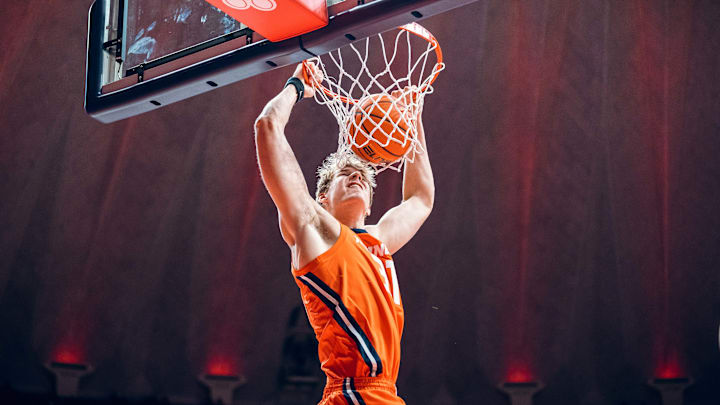 Illinois center Jason Jakstys (11) hammers home a dunk in the Illini's 113-70 win over Florida Gulf Coast last Friday at the State Farm Center in Champaign, Illinois.