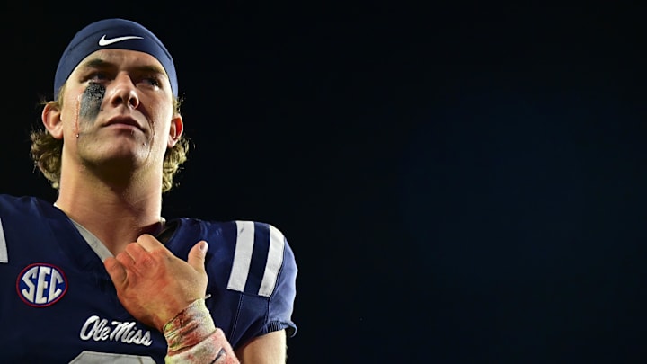 Nov 29, 2024; Oxford, Mississippi, USA; Mississippi Rebels quarterback Jaxson Dart (2) reacts after the game against the Mississippi State Bulldogs at Vaught-Hemingway Stadium. Mandatory Credit: Matt Bush-Imagn Images