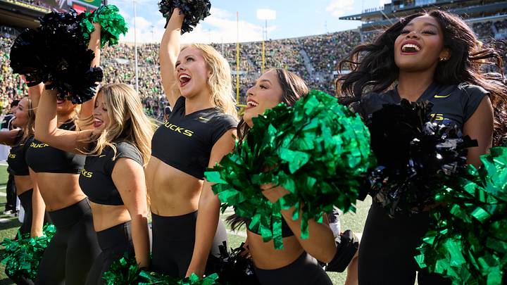 Oct 10, 2026; Eugene, Oregon, USA; The Oregon Ducks cheer team sing along to a song during the second half in a game between the UCLA Bruins and the Oregon Ducks at Autzen Stadium. Mandatory Credit: Troy Wayrynen-Imagn Images Oct 10, 2026; Eugene, Oregon, USA; The Oregon Ducks cheer team sing along to a song during the second half in a game between the UCLA Bruins and the Oregon Ducks at Autzen Stadium. Mandatory Credit: Troy Wayrynen-Imagn Images
