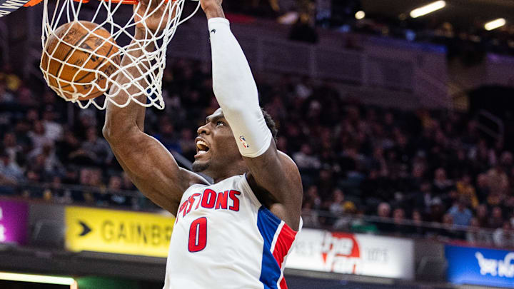 Nov 29, 2024; Indianapolis, Indiana, USA; Detroit Pistons center Jalen Duren (0) shoots the ball while Indiana Pacers center Myles Turner (33) defends in the second half  at Gainbridge Fieldhouse. Mandatory Credit: Trevor Ruszkowski-Imagn Images