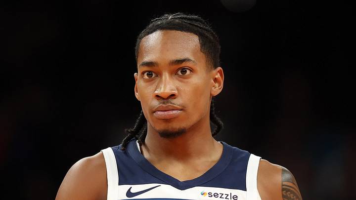 Nov 21, 2025; Phoenix, Arizona, USA; Minnesota Timberwolves guard Rob Dillingham (4) against the Phoenix Suns during an NBA Cup game at Mortgage Matchup Center. Mandatory Credit: Mark J. Rebilas-Imagn Images