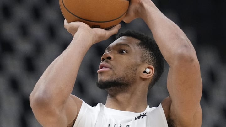 Apr 25, 2025; Milwaukee, Wisconsin, USA; Milwaukee Bucks forward Giannis Antetokounmpo (34) warms up with his brother Thansis Anteokounmpo (43) before game three of first round of the 2024 NBA Playoffs at Fiserv Forum. Mandatory Credit: Michael McLoone-Imagn Images Apr 25, 2025; Milwaukee, Wisconsin, USA; Milwaukee Bucks forward Giannis Antetokounmpo (34) warms up with his brother Thansis Anteokounmpo (43) before game three of first round of the 2024 NBA Playoffs at Fiserv Forum. Mandatory Credit: Michael McLoone-Imagn Images