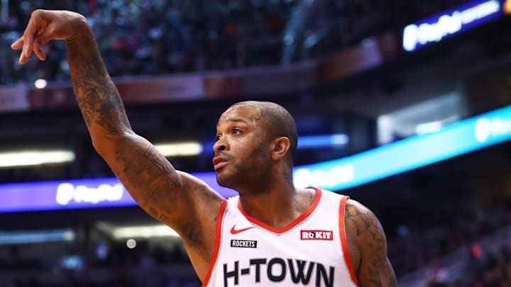 Former Houston Rockets forward PJ Tucker shoots a basket.