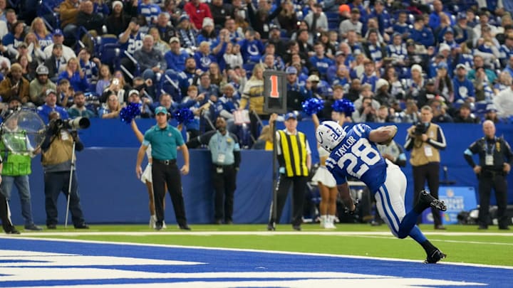 Indianapolis Colts running back Jonathan Taylor (28) rushes for a touchdown Sunday, Jan. 5, 2025, during a game against the Jacksonville Jaguars at Lucas Oil Stadium in Indianapolis. Indianapolis Colts running back Jonathan Taylor (28) rushes for a touchdown Sunday, Jan. 5, 2025, during a game against the Jacksonville Jaguars at Lucas Oil Stadium in Indianapolis.