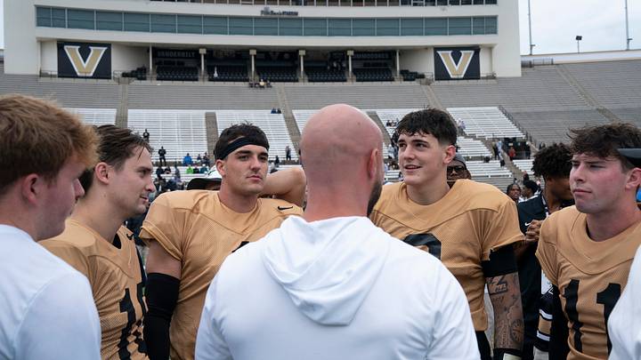 Vanderbilt quarterbacks, from left, Whit Muschamp (10), Blaze Berlowitz (1), Jared Curtis (2) and Jack Elliott (11) gather for a talk after Vanderbilt Football's Black and Gold Spring Game in FirstBank Stadium at Vanderbilt University Saturday, April 18, 2026. Vanderbilt quarterbacks, from left, Whit Muschamp (10), Blaze Berlowitz (1), Jared Curtis (2) and Jack Elliott (11) gather for a talk after Vanderbilt Football's Black and Gold Spring Game in FirstBank Stadium at Vanderbilt University Saturday, April 18, 2026.