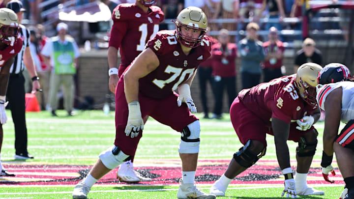 Sep 28, 2024; Chestnut Hill, Massachusetts, USA; Boston College Eagles offensive lineman Ozzy Trapilo (70) waits for the snap during the second half against the Western Kentucky Hilltoppers at Alumni Stadium. Mandatory Credit: Eric Canha-Imagn Images Sep 28, 2024; Chestnut Hill, Massachusetts, USA; Boston College Eagles offensive lineman Ozzy Trapilo (70) waits for the snap during the second half against the Western Kentucky Hilltoppers at Alumni Stadium. Mandatory Credit: Eric Canha-Imagn Images