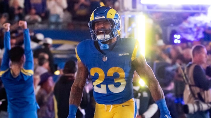 Jan 13, 2025; Glendale, AZ, USA; Los Angeles Rams running back Kyren Williams (23) against the Minnesota Vikings during an NFC wild card game at State Farm Stadium. Mandatory Credit: Mark J. Rebilas-Imagn Images