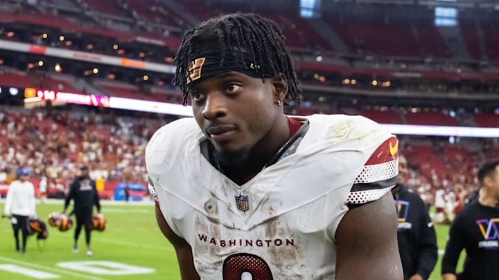 Sep 29, 2024; Glendale, Arizona, USA; Washington Commanders running back Brian Robinson Jr. (8) against the Arizona Cardinals at State Farm Stadium. Mandatory Credit: Mark J. Rebilas-Imagn Images