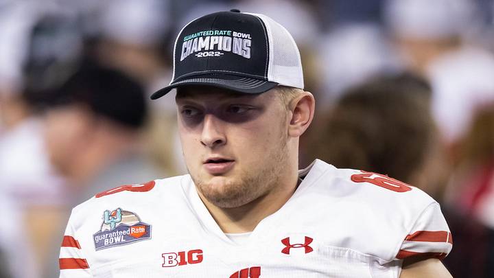 Dec 27, 2022; Phoenix, Arizona, USA; Wisconsin Badgers defensive end Ben Barten (68) against the Oklahoma State Cowboys during the 2022 Guaranteed Rate Bowl at Chase Field. Dec 27, 2022; Phoenix, Arizona, USA; Wisconsin Badgers defensive end Ben Barten (68) against the Oklahoma State Cowboys during the 2022 Guaranteed Rate Bowl at Chase Field.