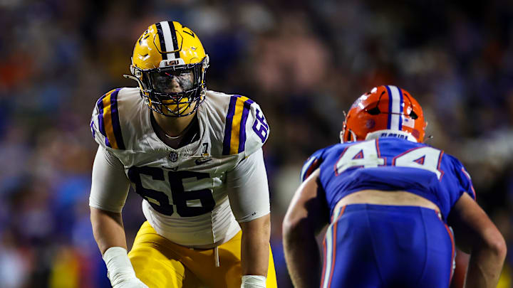 LSU Tigers offensive tackle Will Campbell (L)